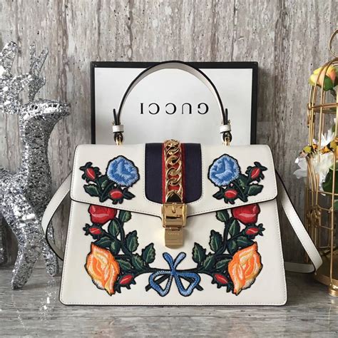 gucci purse with embroidered flowers